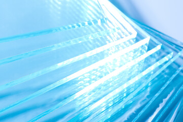 Obraz premium Closeup view of many stacked glass sheets