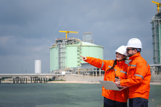 Petroleum Engineering Team Planning Crude Oil Petroleum engineer team is analyzing ongoing energy conservation plans to further improve the energy efficiency