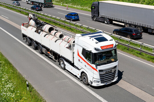 Wiehl, Germany - May 26, 2026: Giesker & Laakmann DAF XG truck with flatbed trailer on motorway
