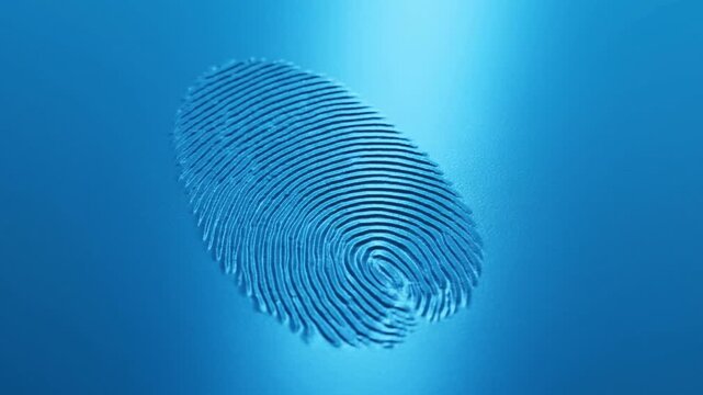 Fingerprint imprint on blue surface representing personal identity and biometric security
