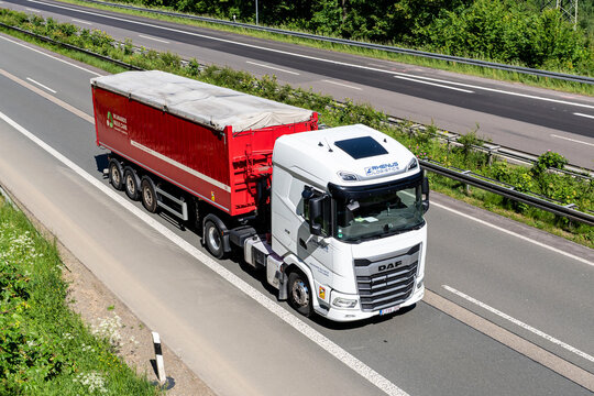 Wiehl, Germany - May 26, 2026: Rhenus Logistics DAF XG truck with Wijnands bulk trailer on motorway