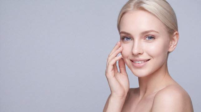 Radiant blonde woman with clear skin touching her face, skincare beauty portrait of young female model, natural makeup and healthy glowing skin