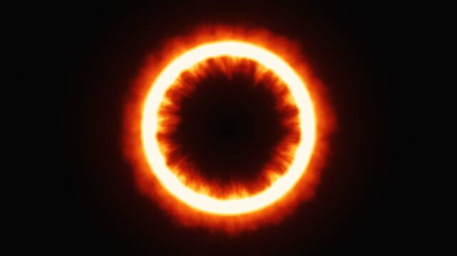 Glowing ring of fire burning against a dark background. 4K Video