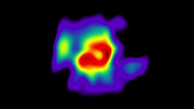 A vibrant heat map displays thermal energy distribution with a colorful gradient, showcasing temperature variations on black background. Loop animation.