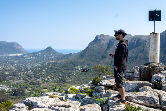 man operating an PFV drone on the mountain