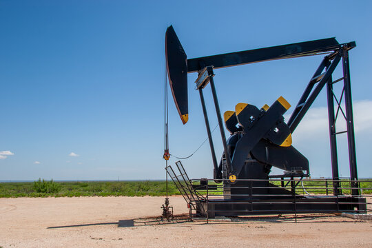 black oil drilling jack in the desert in the USA