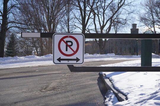 no parking sign on a road