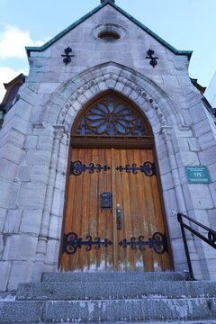 wooden door of a church in quebec, canada