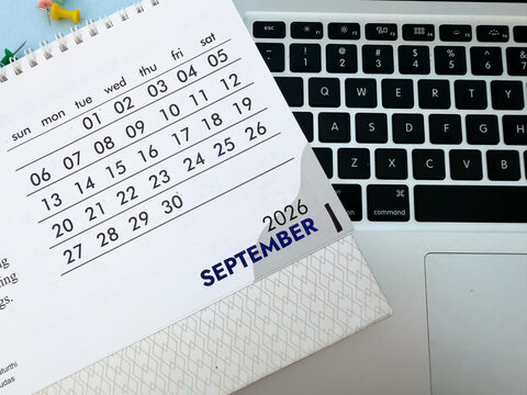 September month 2026 desk calendar business event schedule concept