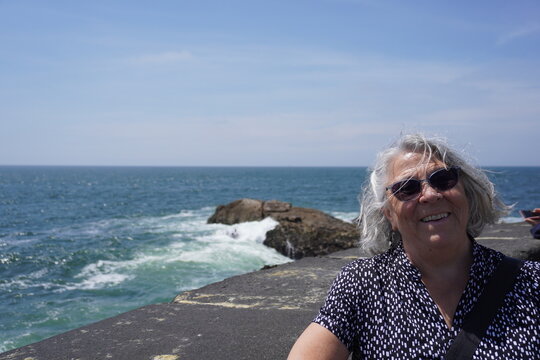 A senior woman enjoying porto