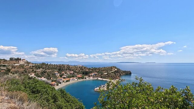 The Harbor in Sampatiki Greece With Blue Skies and Water
