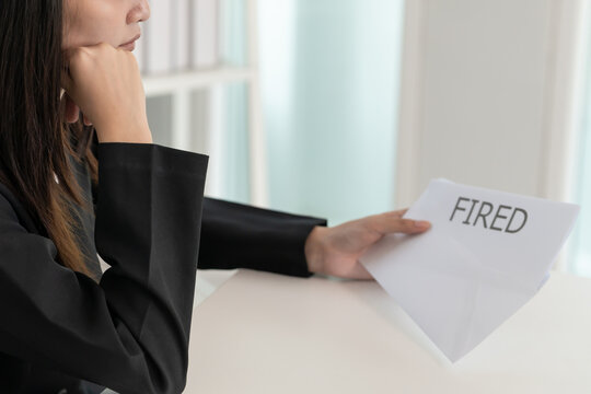 Stressful business women receive fired letters from the company. job placement and vacancies, career problem, problem life, career problem, save cost, sudden unemployment, debt burden, resignation