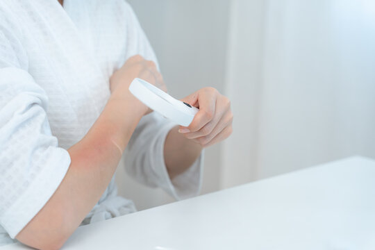 skin problem and beauty. asian woman use magnifying glass look itchy skin from skin allergic, shocked, steroid allergy, sensitive, chemical allergy, rash, insect bites, Seborrheic Dermatitis.