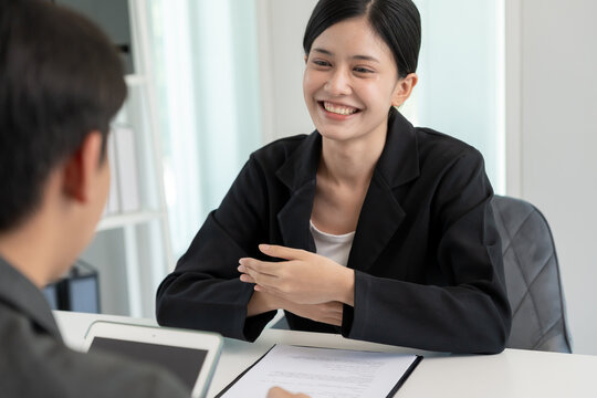business woman explain application documents and resume for match the position. company publishes vacancies online to find human. Human resource, interview, letters, competence.