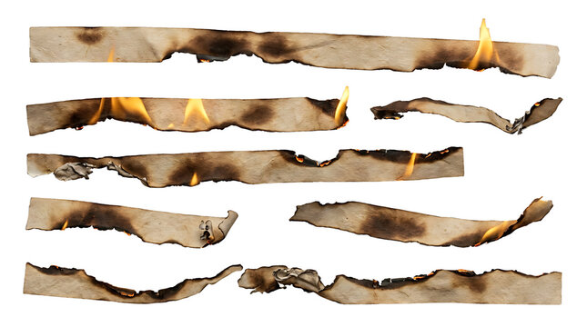 Collection of burning paper strips with scorched edges on white background burnt edges flaming paper fire effect paper fragments charred paper fire flames isolated paper destroyed documents