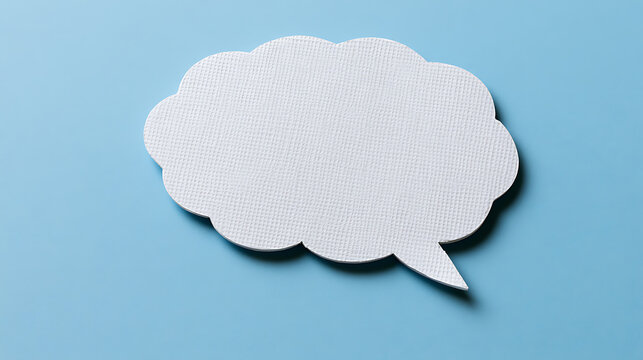 A blank white paper speech bubble shaped like a cloud rests on a vibrant blue background, ready for custom text and creative design