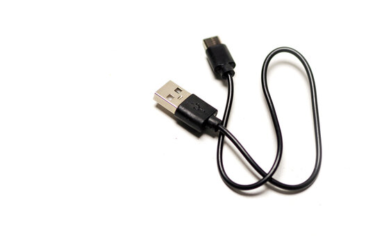 A coiled black USB cable with standard USB-A and micro-USB connectors set against a plain white background.
