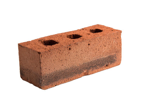 A close-up view of a single red brick with three circular holes, showcasing its textured surface and earthy tones