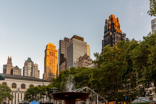 New York City skyscrapers at sunset viewed from Bryant Park