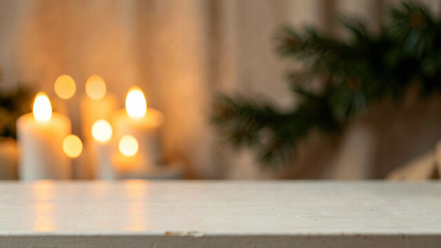 Pine Branch Over an Empty Pale Limewashed Wood Table for Product Display