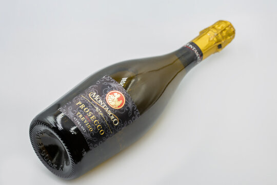 Montasolo Prosecco DOC Treviso Extra Dry bottle closeup on white.