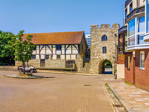 A view through the medieval Westgate town wall gate in Southampton, England, in summertime