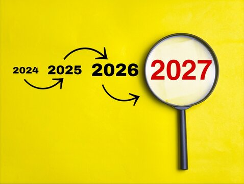 Magnifying glass focusing on year 2027 with timeline arrows on yellow background for future plans.