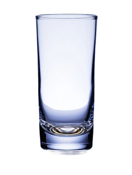 A tall, empty, clear glass tumbler with a solid base is isolated against a pure white backdrop