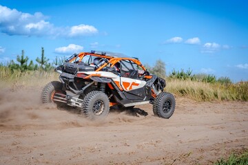 UTV, ATV, 4x4 adventure. Buggy extreme ride on sandy track © Antonio