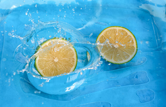 Fresh lime with water splash