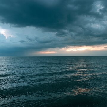 moody ocean horizon moments before the storm, with heavy clouds rolling across the sky and darkening waves below.