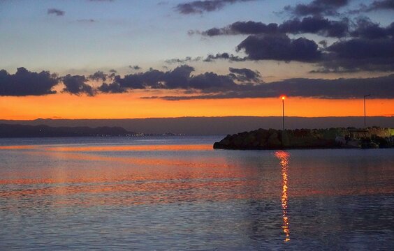 A colorful sunset on the shore of Glyfada, Greece
