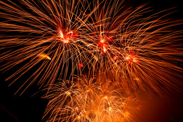 Obraz premium Celebration festival colorful gold yellow firework display set for happy new year and merry christmas fireworks