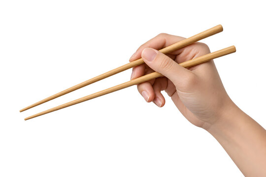 A hand holding wooden chopsticks for eating asian food presented as a high quality png isolated on transparent background