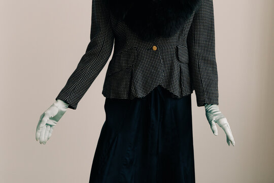 Tailored fashion detail with mint satin gloves