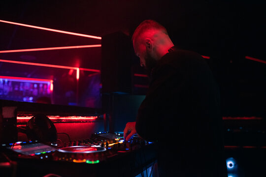 DJ focused on playing his set at club