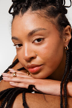 Portrait of a Person With Braids Posing Indoors