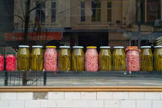 Jars of Lebanese Pickles and Vegetables on Display in a Market Window
