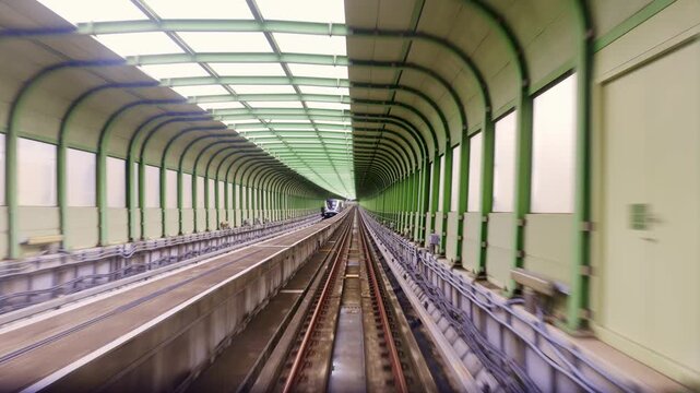 Taichung, Taiwan-6.20.2026: The Taichung MRT train climbs the ramp and enters the station
