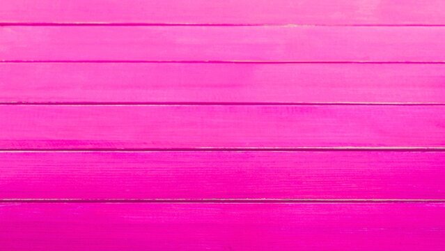 Vibrant pink wooden plank background for creative projects