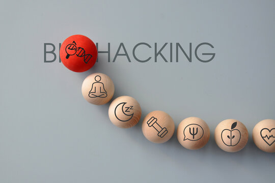 Conceptual composition showing a sequence of wellness and biohacking symbols, illustrating a journey toward personal optimization, longevity and improved performance.
