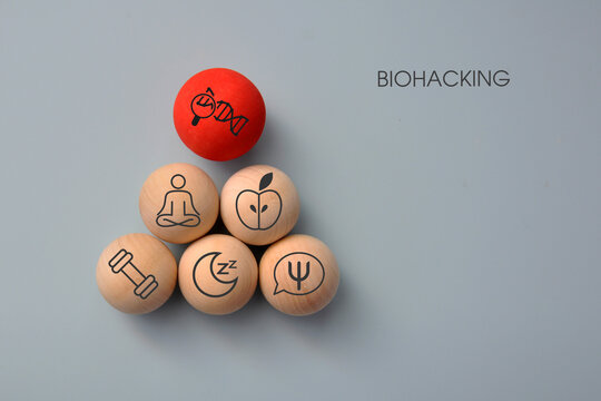 Conceptual biohacking, with icons of a heart and a brain, symbolizing good health, optimization, and self‑improvement.