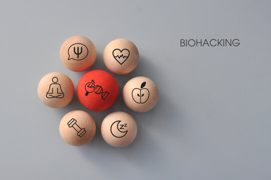 Conceptual biohacking, with icons of a heart and a brain, symbolizing good health, optimization, and self‑improvement.