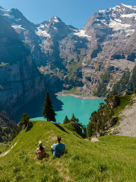 Breathtaking views of Oeschinensee in Kandersteg, Switzerland surrounded by majestic mountains