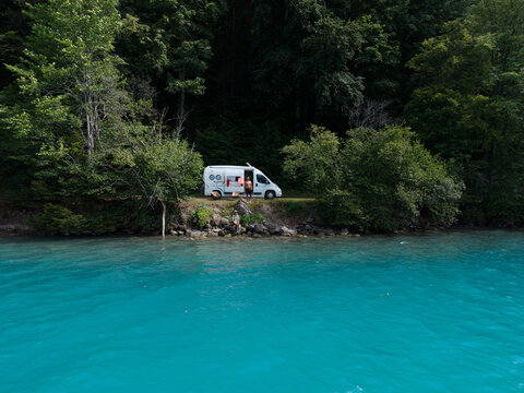 Stunning turquoise water and a camper van in beautiful Interlaken, Switzerland