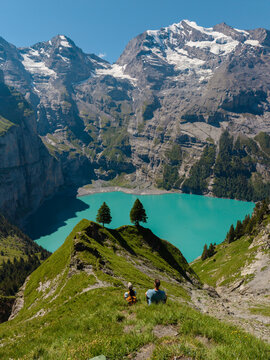 Breathtaking views of Oeschinensee in Sierre, Switzerland on a sunny day
