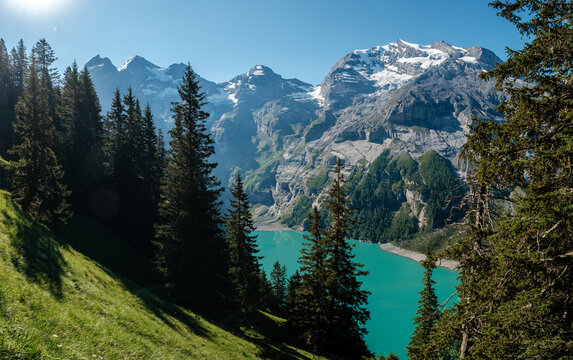 Majestic landscapes of Oeschinensee in Kandersteg, Switzerland during a sunny day