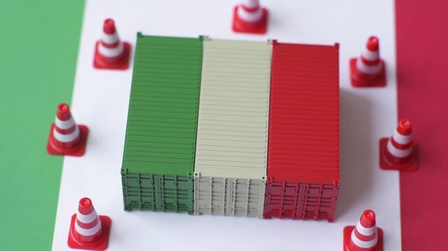 The cargo container ban on the Italian flag as a conceptual backdrop. Cargo container embargo