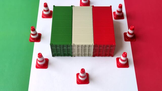 The cargo container ban on the Italian flag as a conceptual backdrop. Cargo container embargo