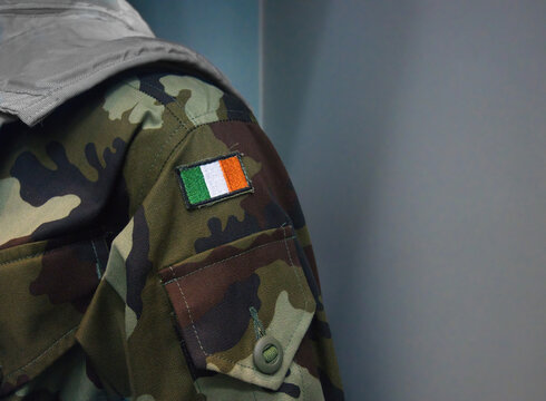 detail of an Irish flag patch on a military army uniform